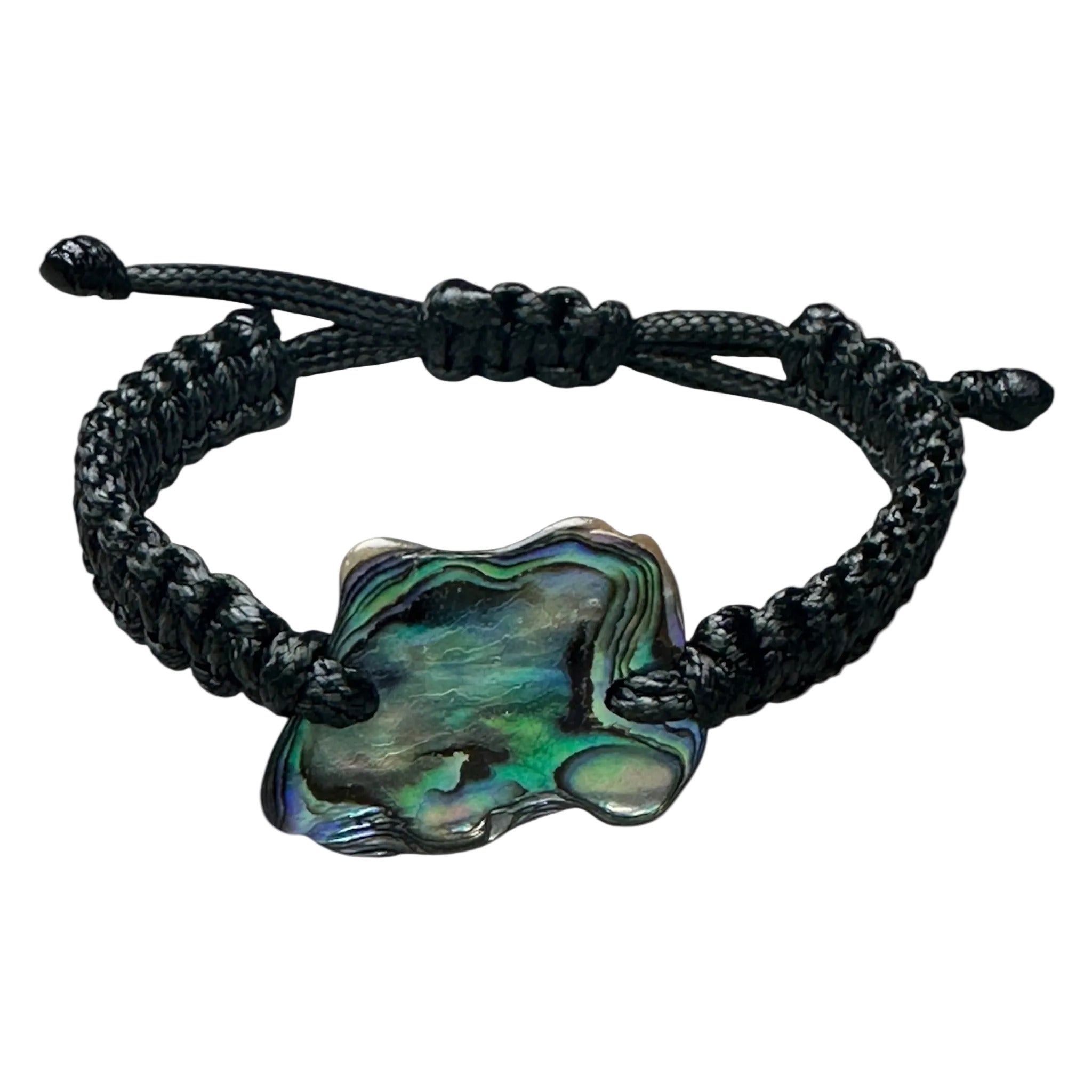 Minimalist black cord bracelet with natural Paua shell, showing shell's colourful texture.