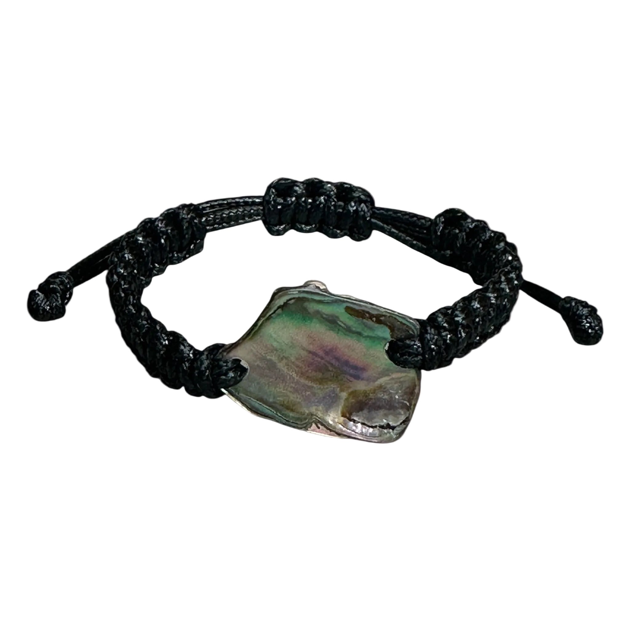 Close view of Paua shell bracelet with adjustable black cord and unique shell patterns.