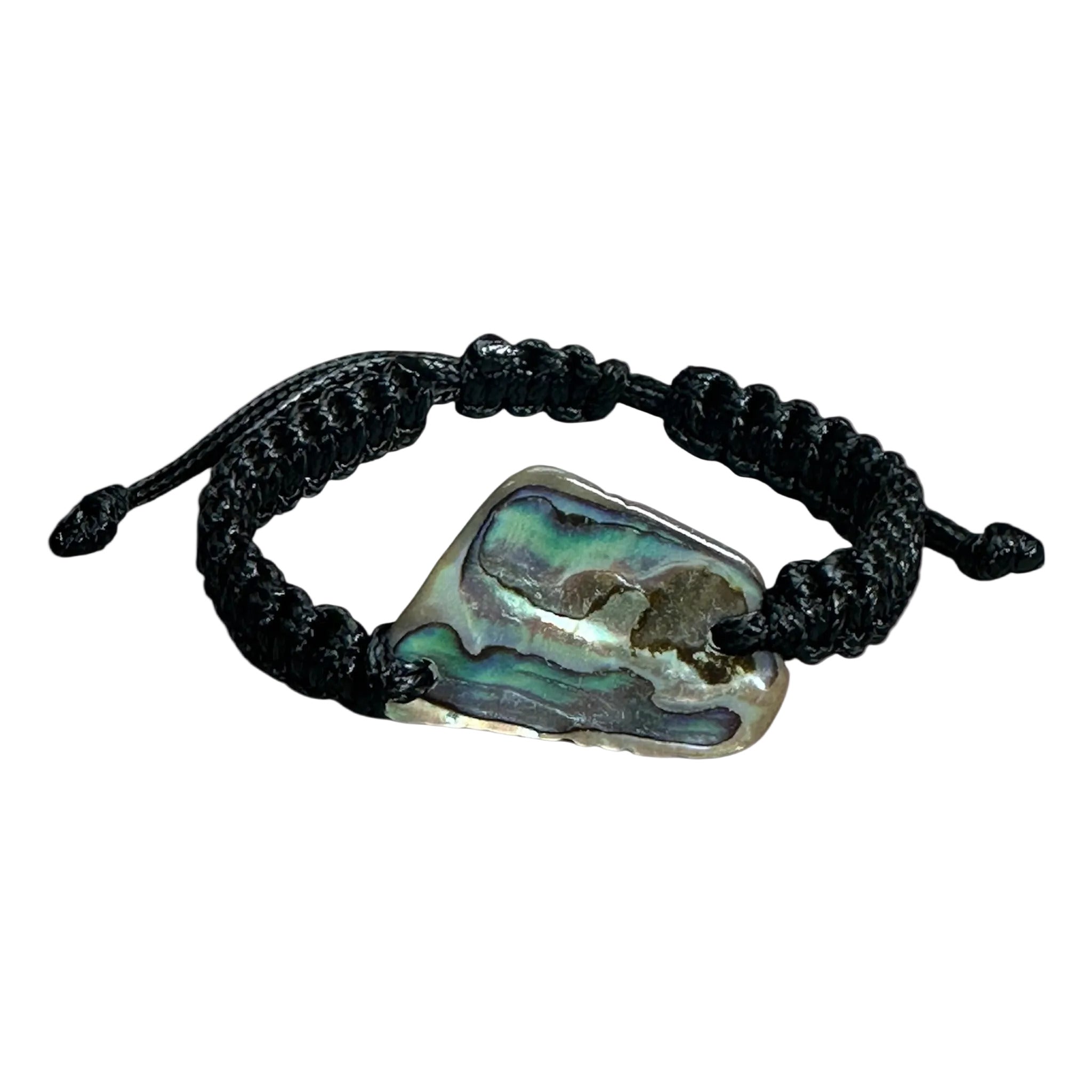 Adjustable handmade bracelet featuring a bold Paua shell centrepiece on strong black cord.