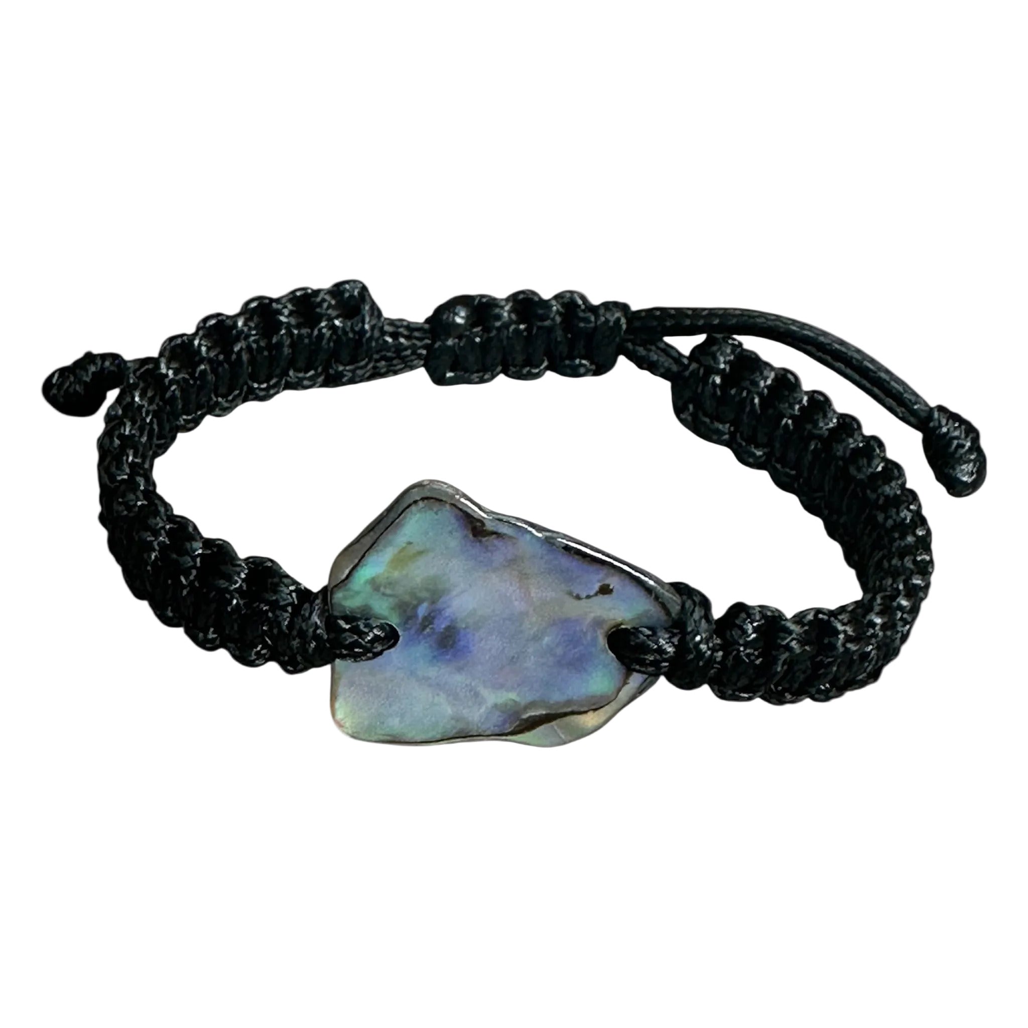 Black knotted bracelet styled on wrist, showing the shine and colour of the Paua shell.